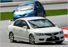 Civic Type R at its birthplace; Jazz following closely during the On Track Course.