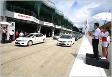 Mr. Takahashi & En. Rohime Shafie, President & COO of HMSB flagging off the media at the track course.