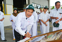 Mr. Toru Takahashi, MD and CEO of HMSB posing before signing the plaque.