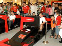 Just like an F1 event - Participants and their fans at the Honda F1 Simulator border=