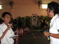 Standard 5 student Anthony Richardo Tan Guan Hong, 11, interacting with speaker Ms. Daisy Poh during the talk.