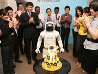 Managing Director and Chief Executive Officer of Honda Malaysia, Mr Atsushi Fujimoto and associates sing ASIMO a Happy Birthday song.