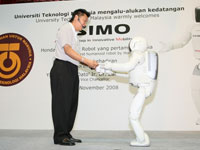 ASIMO can now serve drinks, making him one step closer to become a possible assistant to human in the future.