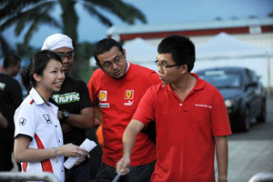 This is how you do it - Kon Wai Luen from Autoworld.com showed his team mates the proper way to flag in during driver change session.